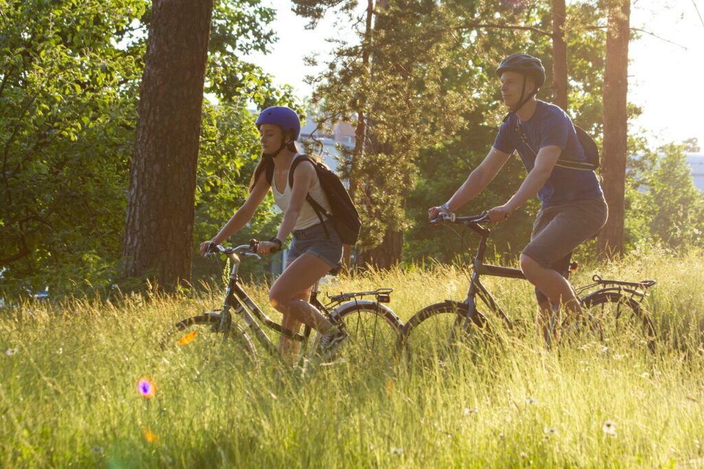 A couple riding bikes in finland